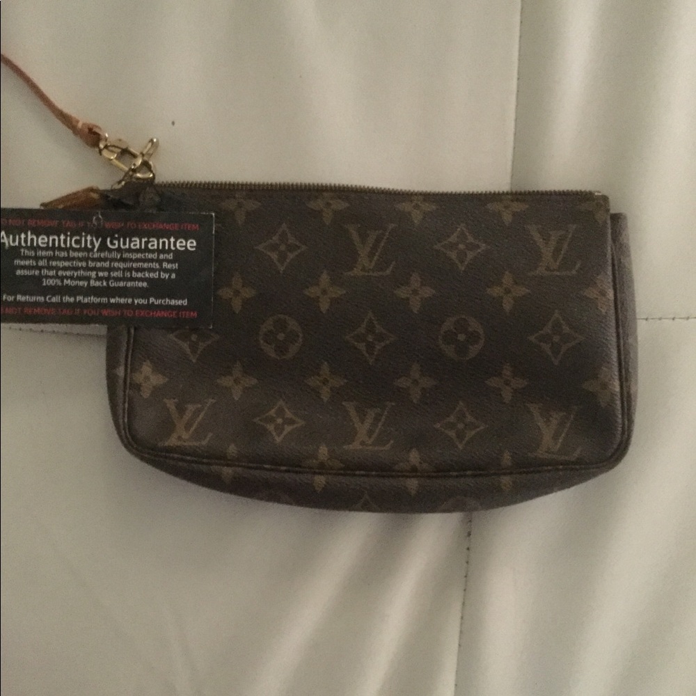 Louie Vuitton Pochette. Verified Authentic!